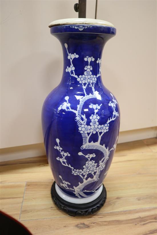 A large Chinese blue and white prunus vase, mounted as a table lamp, drilled base, total height fitting 66cm
